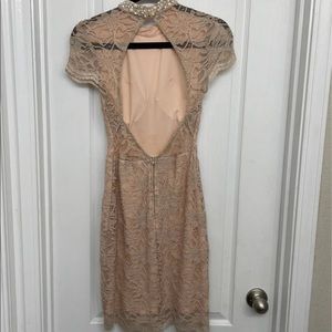 City triangles. Short lace/beaded dress.